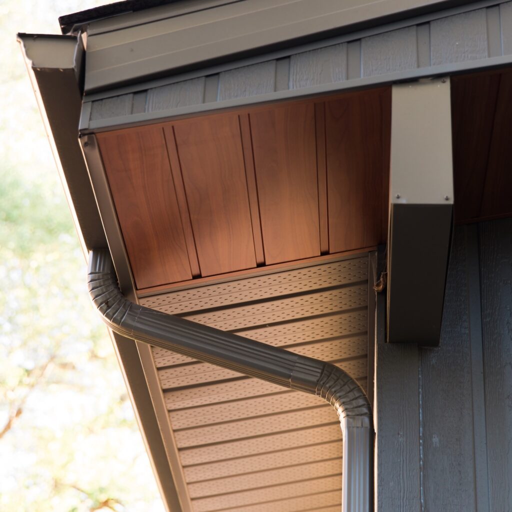 Close-up of soffit, fascia, and gutter on a modern home exterior