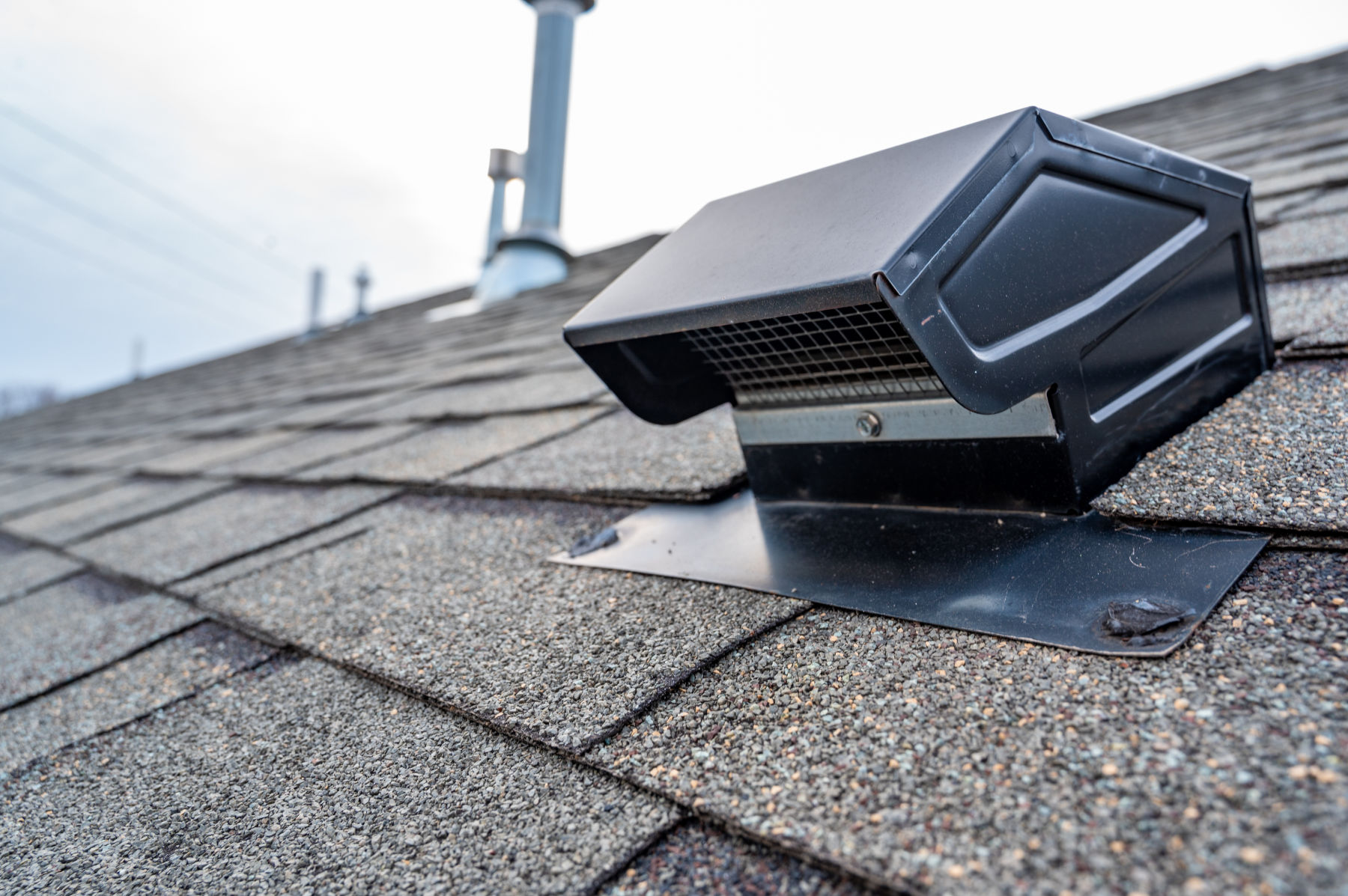 Typical static passive vent installation on a residential roof