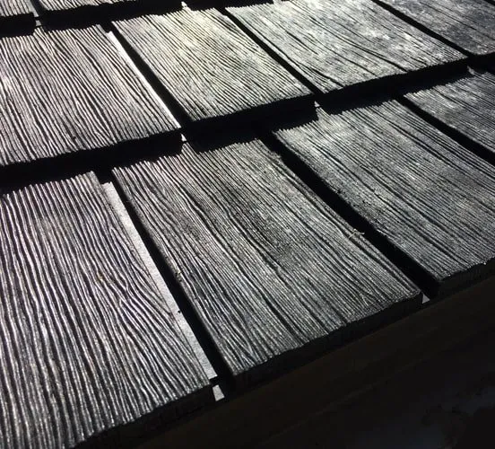 Close up of rubber shake and slate roofing