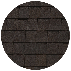 Close-up of black architectural shingles in a staggered pattern