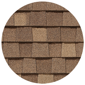 Close-up of light brown architectural shingles in a staggered pattern