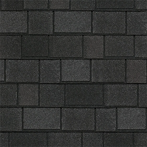 Close-up of black architectural shingles with contrasting layered tabs
